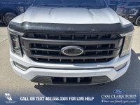 This 2022 Ford F-150 Lariat 502A in Oxford White is a perfect blend of strength, technology, and pre... (image 9)