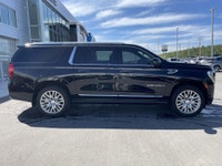 The 2023 GMC Yukon XL Denali is a full-size SUV that redefines luxury and capability, offering an ex... (image 9)