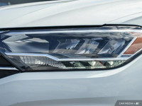 This 2021 Volkswagen Jetta Highline shines with its sleek Pure White exterior and luxurious Titan Bl... (image 9)