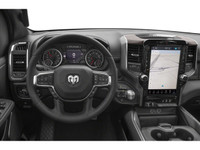 The 2026 Ram 1500 Laramie in a striking black exterior, matched with a robust 4x4 drivetrain, delive... (image 3)