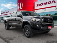 Conquer any terrain with this 2020 Toyota Tacoma Crew Cab Pickup, boasting a rugged Magnetic Grey Me... (image 7)