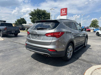 Command attention in this sleek 2015 Hyundai Santa Fe Sport Limited, boasting a luxurious Titanium S... (image 4)