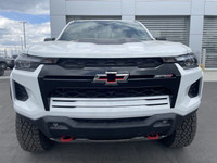 The 2025 Chevrolet Colorado ZR2, presented in Summit White with a Jet Black/Artemis interior, is eng... (image 1)