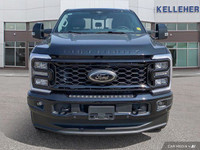 This Ford Super Duty F-250 SRW has a durable Intercooled Turbo Diesel V-8 6.7 L/406 engine powering... (image 7)