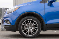 Discover comfort and confidence in this 2018 Buick Encore AWD Essence. With all-wheel drive capabili... (image 6)