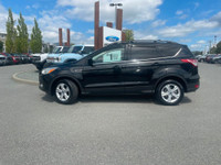 This 2019 Ford Escape SE has a Tuxedo Black exterior and Charcoal Black seats with seating for 5. Eq... (image 2)