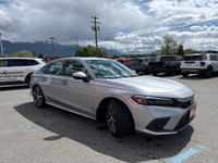 The 2022 Honda Civic Sedan Touring combines sleek styling, advanced technology, and impressive perfo... (image 2)
