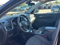 The 2019 Chevrolet Equinox LT in a classic color merges the convenience of an SUV with the agility o... (image 7)