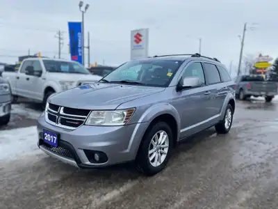The 2017 Dodge Journey SXT is a stylish and versatile midsize SUV designed for families and adventur...