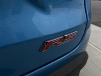 Zipping through the streets of Calgary, the 2025 Chevrolet Trax in Summit White is a sight to behold... (image 6)
