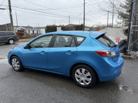 Check out this 2011 Mazda MAZDA3 Hatchback! With a sleek blue exterior and spacious interior, this c... (image 1)