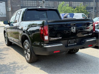 Pristine condition and Fully loaded Honda Ridgeline Touring with LOW KMs! This 4 door All Wheel Driv... (image 3)