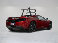This stunning 2014 McLaren MP4-12C Spider delivers an exhilarating open-top driving experience with... (image 3)