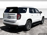The 2022 Chevy Tahoe 4WD includes leather seating, heated front seats, heated mirrors, and tri-zone... (image 5)