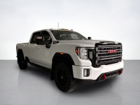 Drive our used Diesel powered 2021 GMC Sierra 2500 AT4 Crew Cab standard box 4X4 in Summit White and... (image 6)