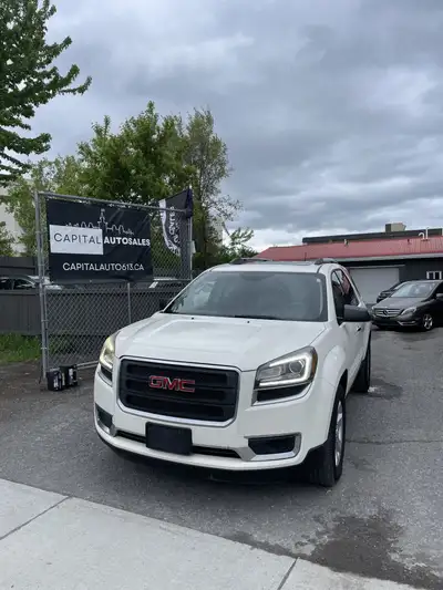 This 2013 GMC Acadia SLE2 is a reliable and spacious SUV for all your adventures! With its sleek whi...