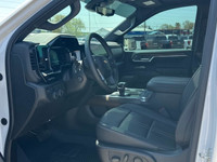 The Chevrolet Silverado 1500 High Country in pristine white with a robust 4×4 drivetrain ensures exc... (image 8)