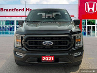 Unleash the power and capability of this 2021 Ford F-150 Crew Cab pickup, a robust truck ready for a... (image 8)