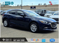 Just Arrived 2018 Mazda MAZDA3 i Touring AT 5-Door Blue has 102,283 KM on it. 2L 4 Cylinder Engine e... (image 2)
