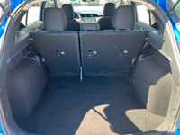 This 2023 Nissan Kicks has a Blue Exterior and Grey Interior with seating for 5. Equipped with a 1.6... (image 5)