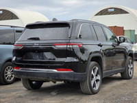 This 2022 Jeep Grand Cherokee 4xe, presented in a menacing and sophisticated *Black* finish, represe... (image 8)