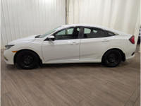 Experience the joy of driving the reliable and efficient Honda Civic Sedan LX Manual, boasting a sop... (image 3)