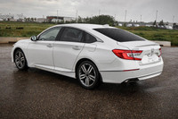Front Wheel Drive,Turbocharged,Intermittent Wipers,Rain Sensing Wipers,Power Mirror(s),Integrated Tu... (image 1)