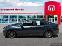 Stock: P11696 Power-adjustable driver's seat, cloth upholstery, one-touch power moonroof, 7-inch tou... (image 1)