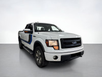 They say go big or go home! Our used 2013 Ford F-150 FX4 SuperCab 4X4 shown in Oxford White is one n... (image 6)