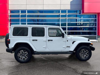 This Jeep Wrangler has a trusty Regular Unleaded V-6 3.6 L/220 engine powering this Automatic transm... (image 7)