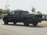 The 2025 GMC Sierra 3500 AT4 stands tall as a powerhouse of rugged sophistication, engineered to tak... (image 5)