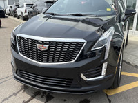 The 2024 Cadillac XT5 Luxury in Stellar Black Metallic combines refined styling with practical perfo... (image 2)