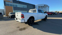 This 2024 RAM 2500 BIG HORN CREW CAB 4X2 has the following options Premium Cloth Bucket Seats, Remot... (image 8)