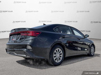 This 2023 Kia Forte LX boasts a sleek black exterior and a surprisingly spacious interior perfect fo... (image 6)