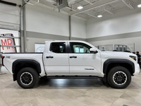 Adventure beckons with the brand-new 2025 Toyota Tacoma in a striking Brown hue, a robust addition t... (image 8)