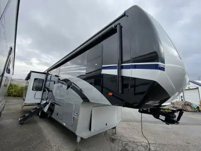 Forest River Cedar Creek Champagne Edition fifth wheel 38EL highlights: Pull-Out Dinette Kitchen Isl...