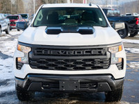 The 2025 Chevrolet Silverado 1500 Custom Trail Boss Crew Cab Standard Box 4-Wheel Drive is a rugged... (image 5)