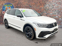 Experience the refined sportiness of this 2023 Volkswagen Tiguan Comfortline R-Line Black Edition. T... (image 7)