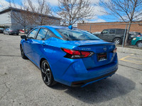 Buckle up, because this 2023 Nissan Versa SR CVT in Electric Blue Metallic isnt just a carits your t... (image 4)