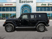 This Jeep Wrangler has a strong Regular Unleaded V-6 3.6 L/220 engine powering this Automatic transm... (image 1)