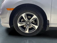Meet the 2019 Honda Odyssey EX-L RES, a silver front-wheel-drive van that promises a smooth journey... (image 7)