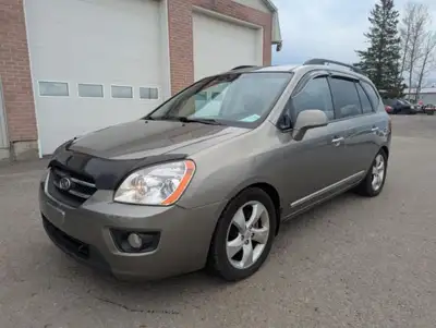 Kia rondo ex v6 2009 7 places, automatique de 161100 km , tout équipé avec air climatisé, vitres et...