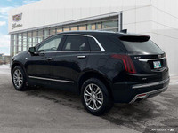 The 2023 Cadillac XT5 includes a hands-free liftgate, panoramic roof, heated front seats, and leathe... (image 2)