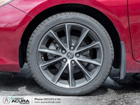 Finished in a Ruby Flare Pearl exterior that complements the Black leather/cloth interior, standing... (image 3)