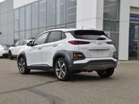 The 2021 Hyundai Kona 1.6T Ultimate AWD in stunning white and featuring an agile all-wheel drive sys... (image 4)