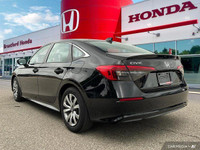 This 2022 Honda Civic Sedan LX boasts a sleek black exterior and a surprisingly spacious interior, p... (image 3)