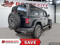 This Jeep Wrangler has a dependable Intercooled Turbo Premium Unleaded I-4 2.0 L/122 engine powering... (image 5)