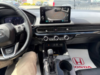 The 2022 Honda Civic Sedan Touring combines sleek styling, advanced technology, and impressive perfo... (image 7)