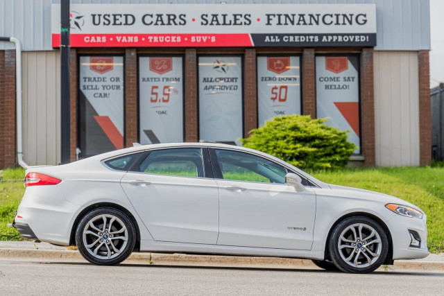 2019 Ford Fusion Hybrid Titanium | Leather | Roof | Nav | Cam |  in Cars & Trucks in Oshawa / Durham Region