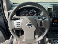 The 2019 Nissan Frontier SL offers a premium blend of rugged capability and refined comfort. Powered... (image 8)